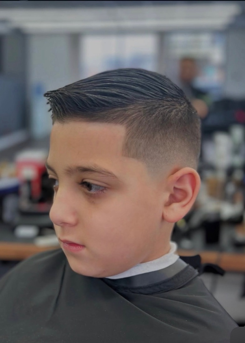 Kids comb over haircut with a clean fade at Slick Fades North Olmsted